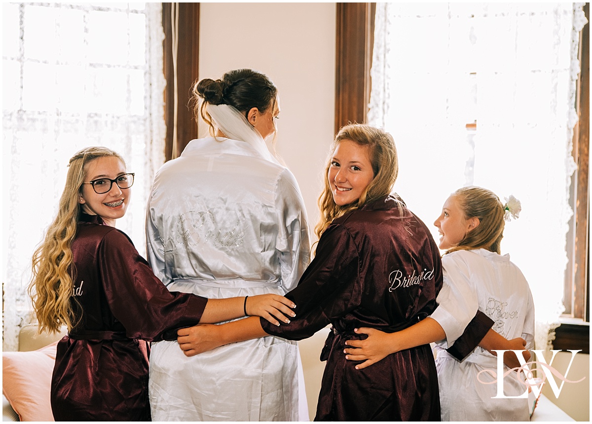 Bride, Bridesmaids, and Flower Girl in robes