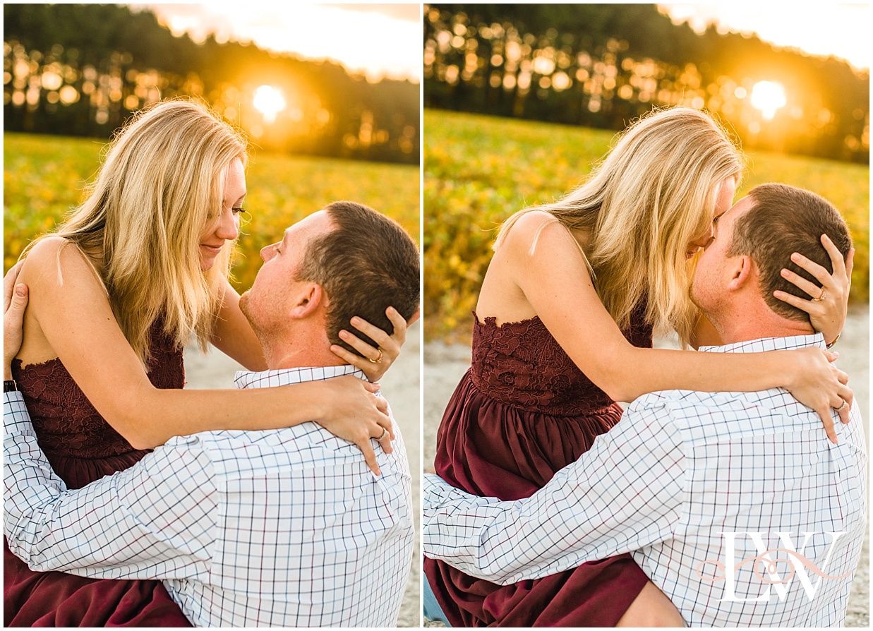 Engaged couple Nose to Nose on the farm field at sunrise in Currituck, taken by Laura Walter Photography.